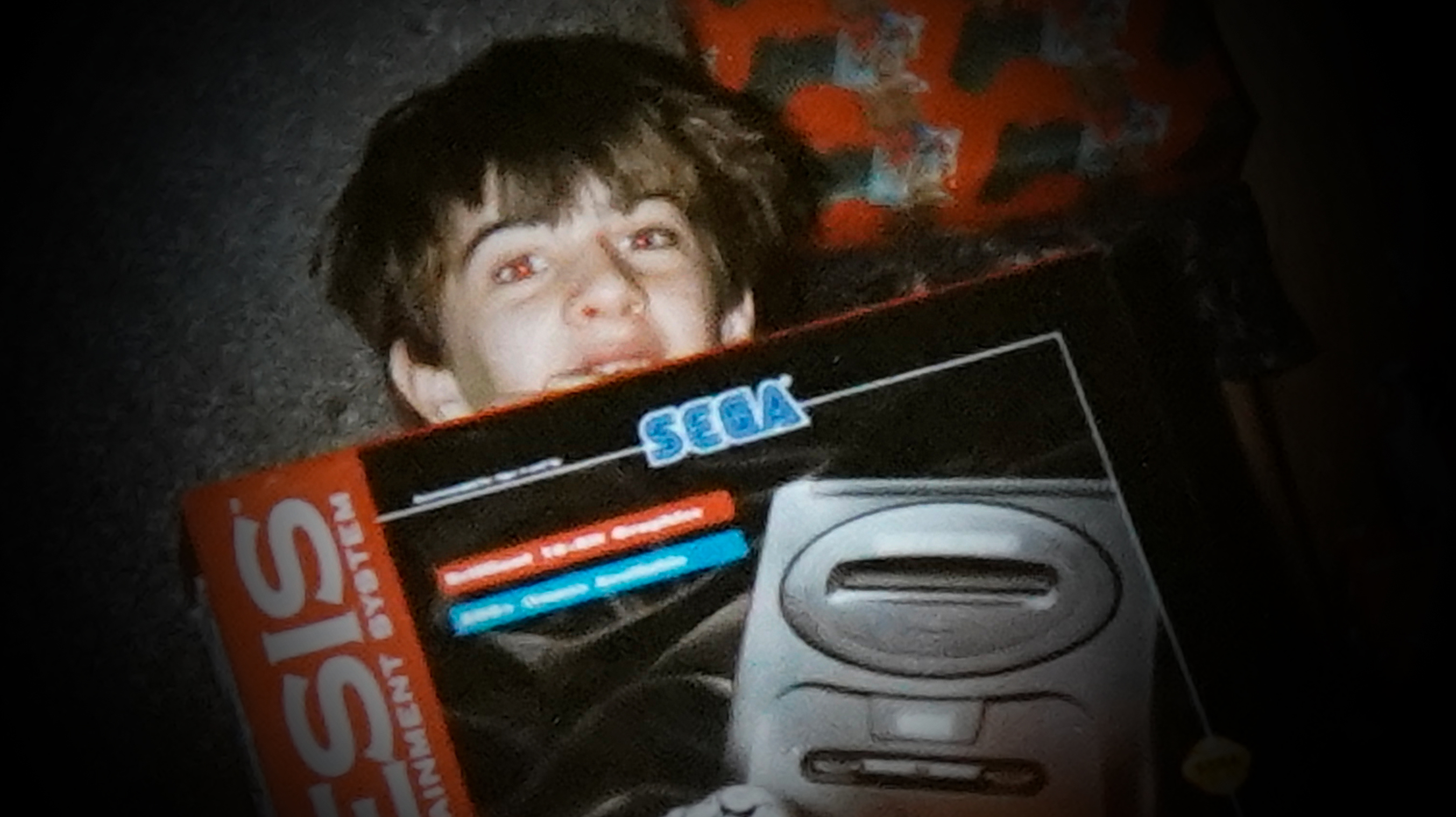 child holding sega genesis for the first time Christmas 1995